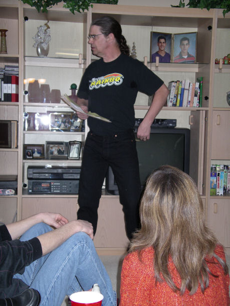 This is a meeting, so first off the business. Cale introduces himself and some history. Here Cale shows us the first Team Rainbo logo it was in hieroglyphics.