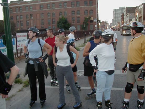 Our tour on skates and in the background the gangster tour bus.
