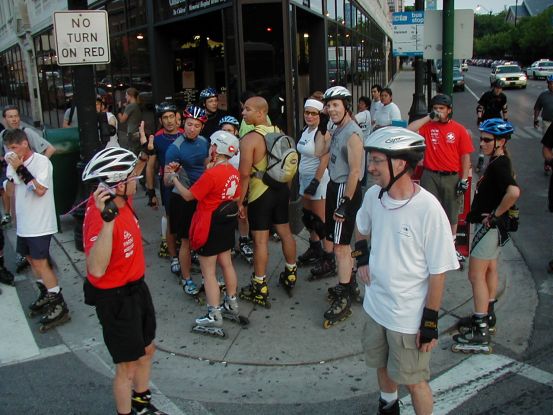 Slightly tame Ravers waiting for the light