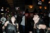 Xena signals an end to the evening with an ear deafening Warrior Princess war whoop. (Two views.)