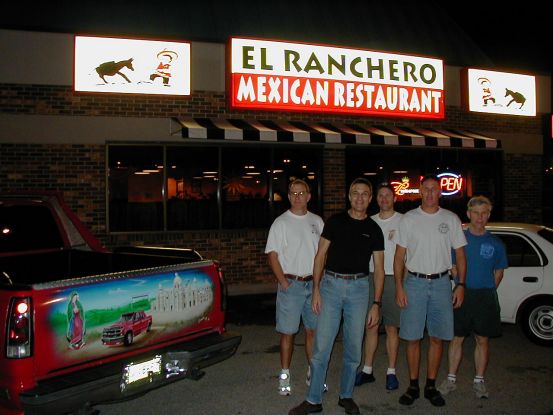 After unknowingly driving though tornadoes in Louisville, Team A-R stops to refuel and possibly get a blessing from the virgin in Nashville. (Check out the truck art.)