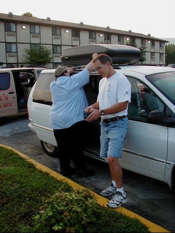 A quick change of keys at home and we're on the road without access to the luggage carrier. Here Ricky the locksmith shows what he's made of as Dan calculates a tip.