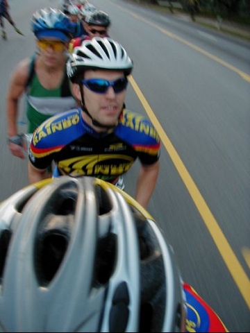 On our way now and Brad checks out the road ahead. On the edge of Athens, the pace line is intact and starting to fly down the hills.