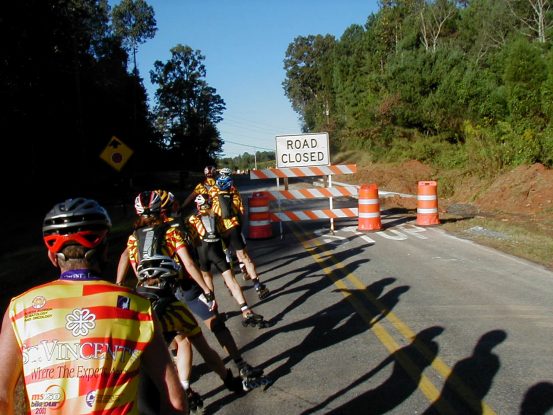 Yes you're seeing right, the road is closed ahead. No asphalt, only curbs, the first half of the clay was packed hard enough to skate on, maybe about 100 yards...